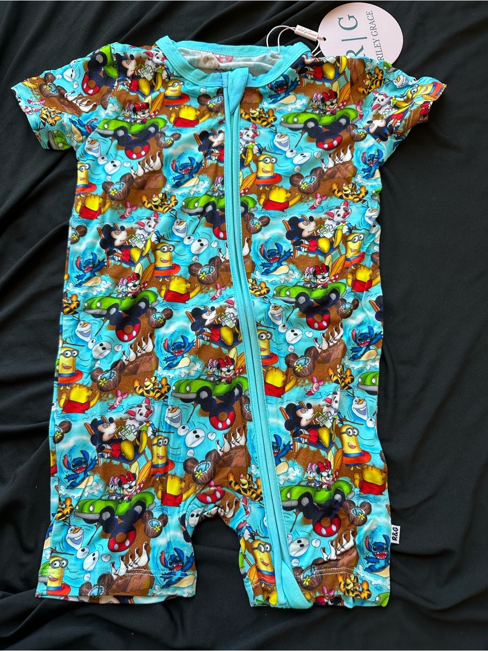 Short-Sleeve Kids Bamboo Romper in Bright Turquoise with Character Mashup Print